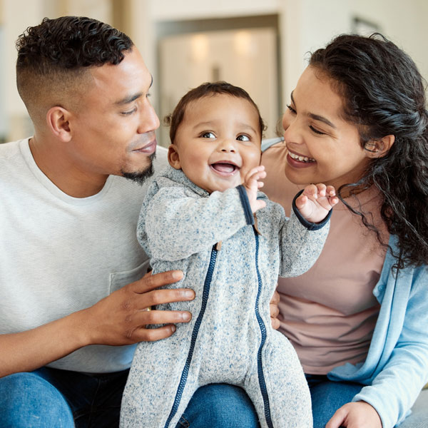 A parent is happy after taking life insurance in the Phoenix area